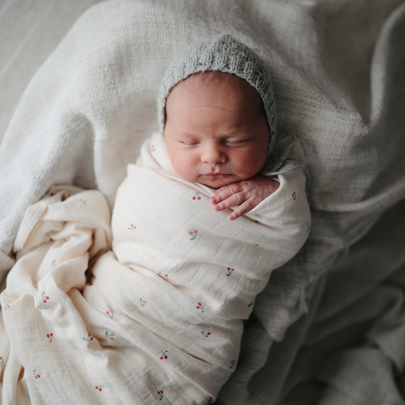 Mushie baby swaddle sale